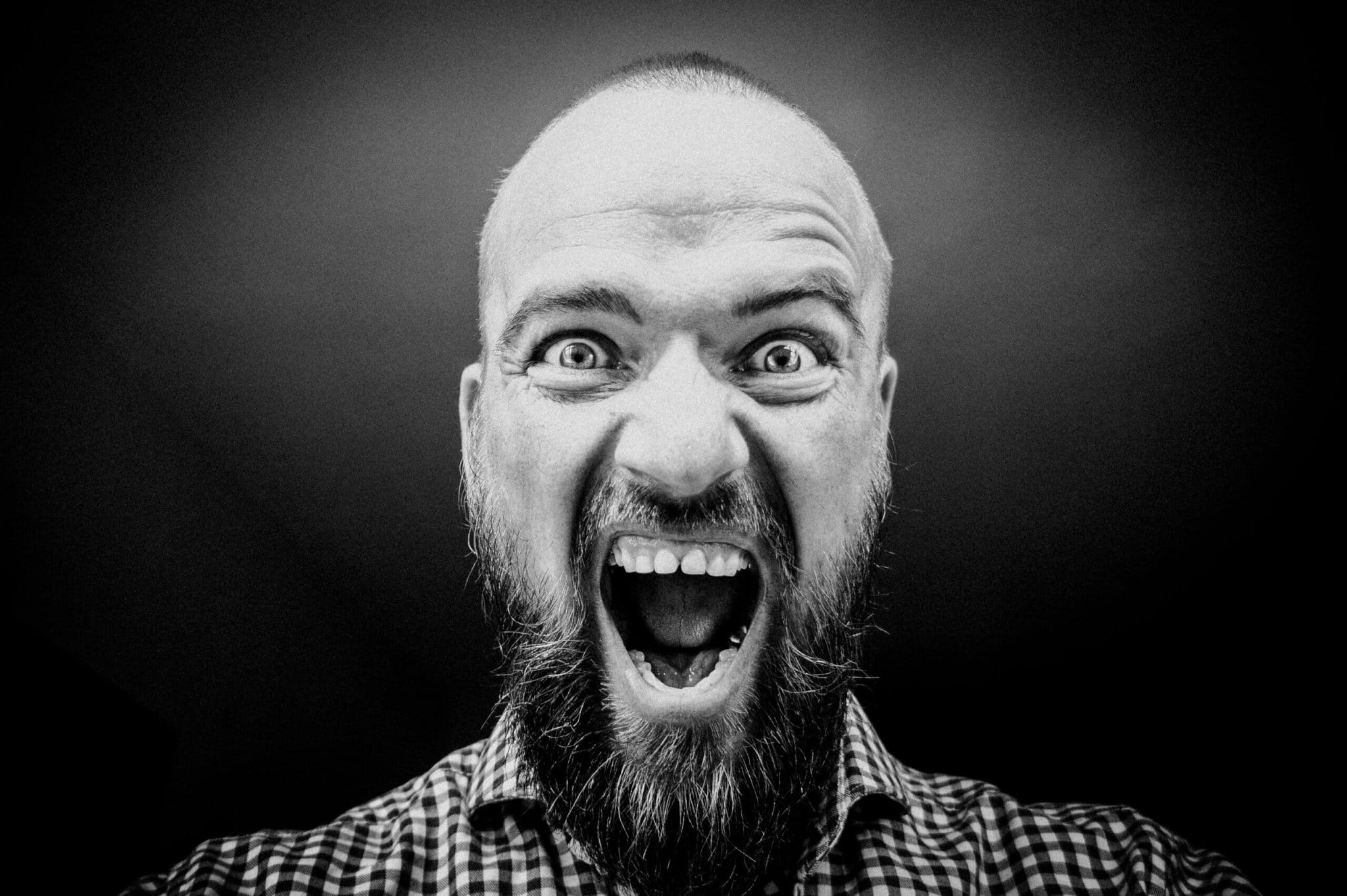 Man Expressing Strong Emotions