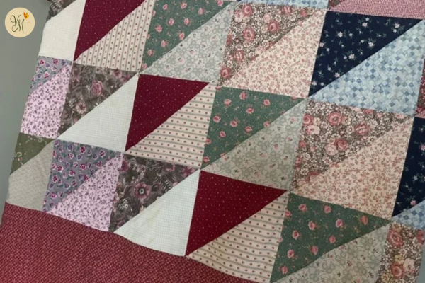 Handmade patchwork quilt illustrating how we can veer from the truth that we are saved by grace through faith.